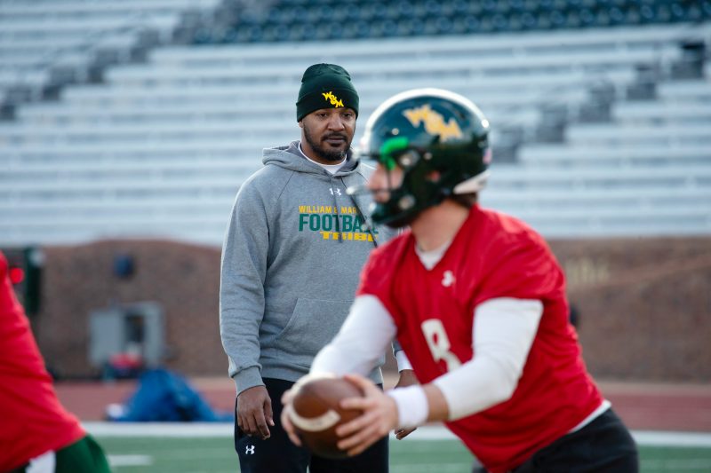 Bryan Randall overseeing a quarterback position drill